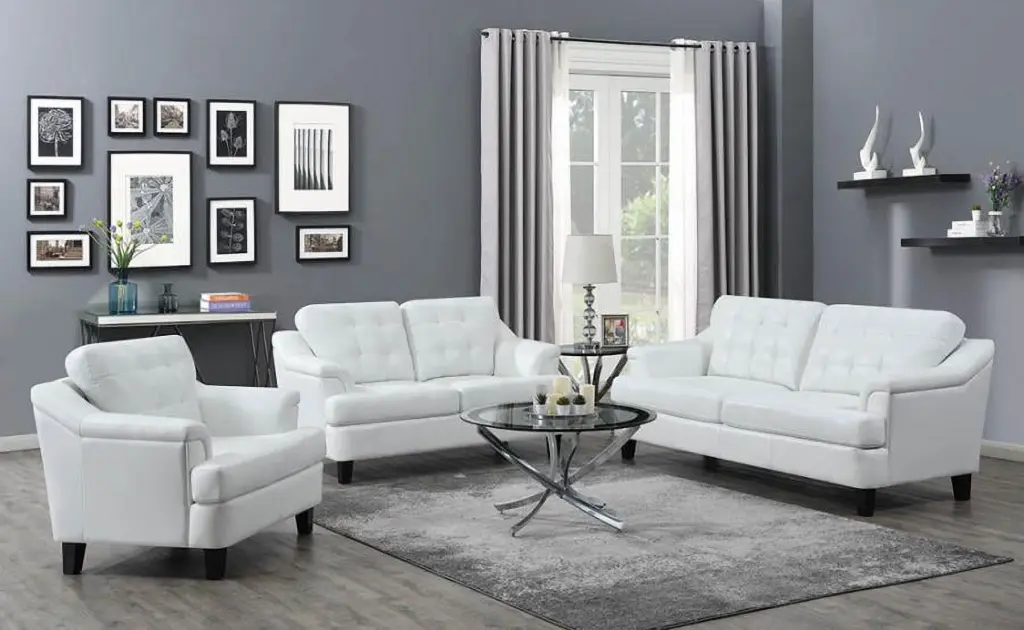 Faux Leather Upholstered Loveseat Tufted Cushioning and Wooden Feet White and Black Coaster Company